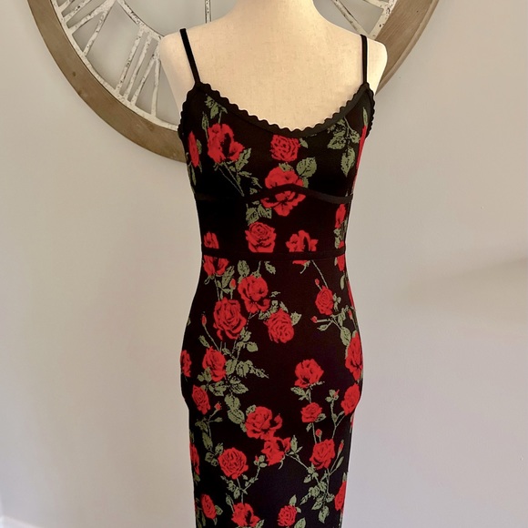 BCBGMaxAzria Dresses & Skirts - BCBG Maxazria *NEW* with tags below the knee dress with Black ribbon at bodice.